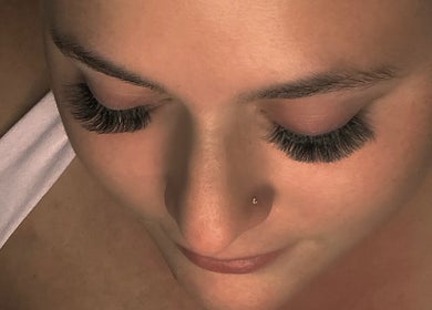 Closeup of eyelash extensions at Myndara Co., Winter Garden, Florida, US. Luxurious beauty treatment showcased.