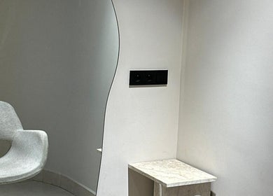 Elegant corner at Redha venue, Marrakesh, Marrakesh-safi, MA showcasing modern chair and mirror.