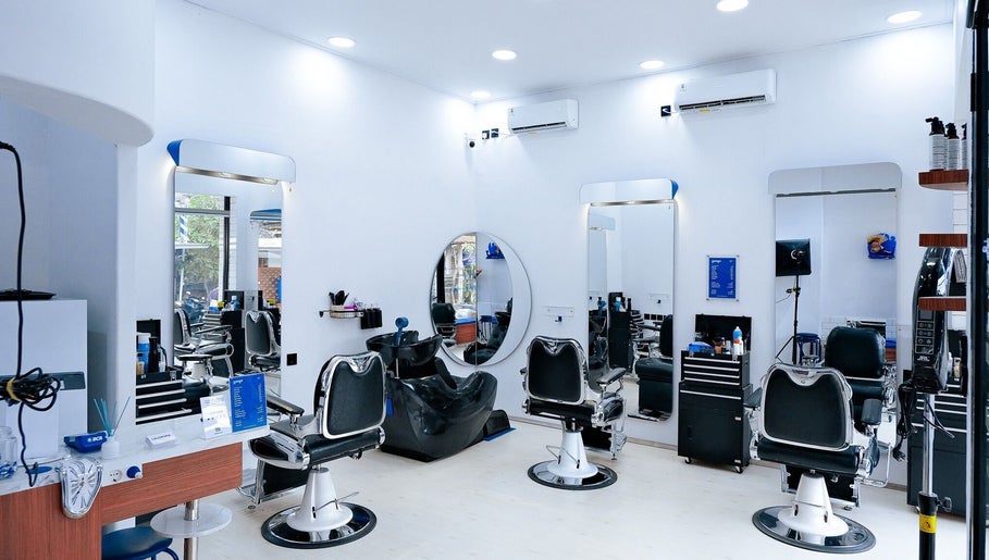 Modern barber chairs and mirrors at Umatura Barber Canggu, Bali, Bali, ID, offering stylish grooming services.