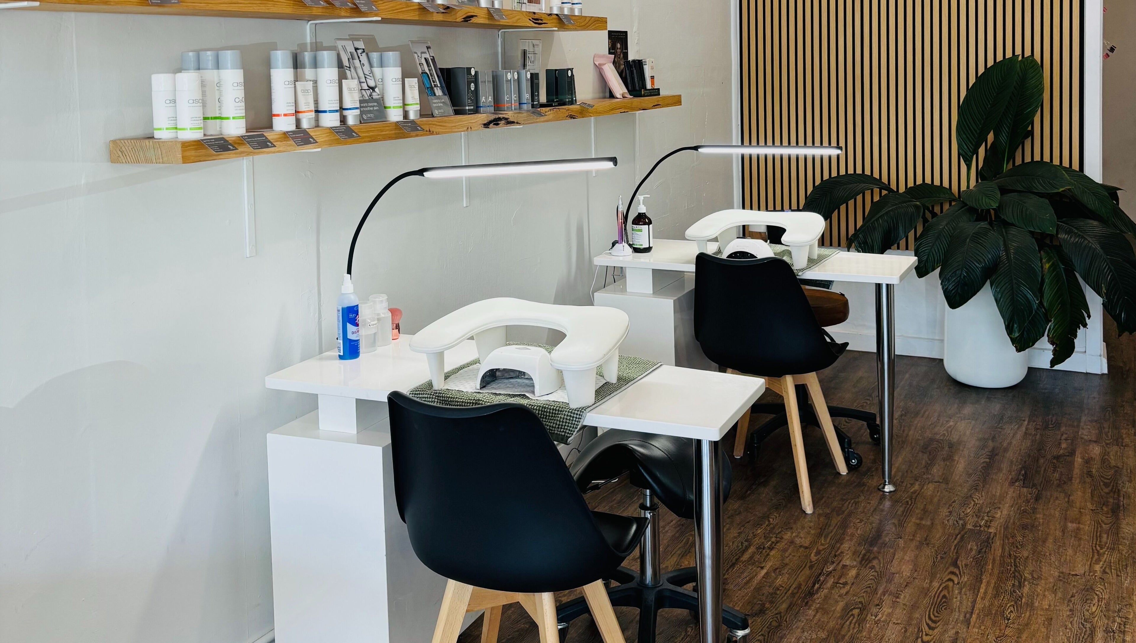 Nail stations at Beauty on Eighth, Mildura, Victoria, AU, featuring modern setup and plants.