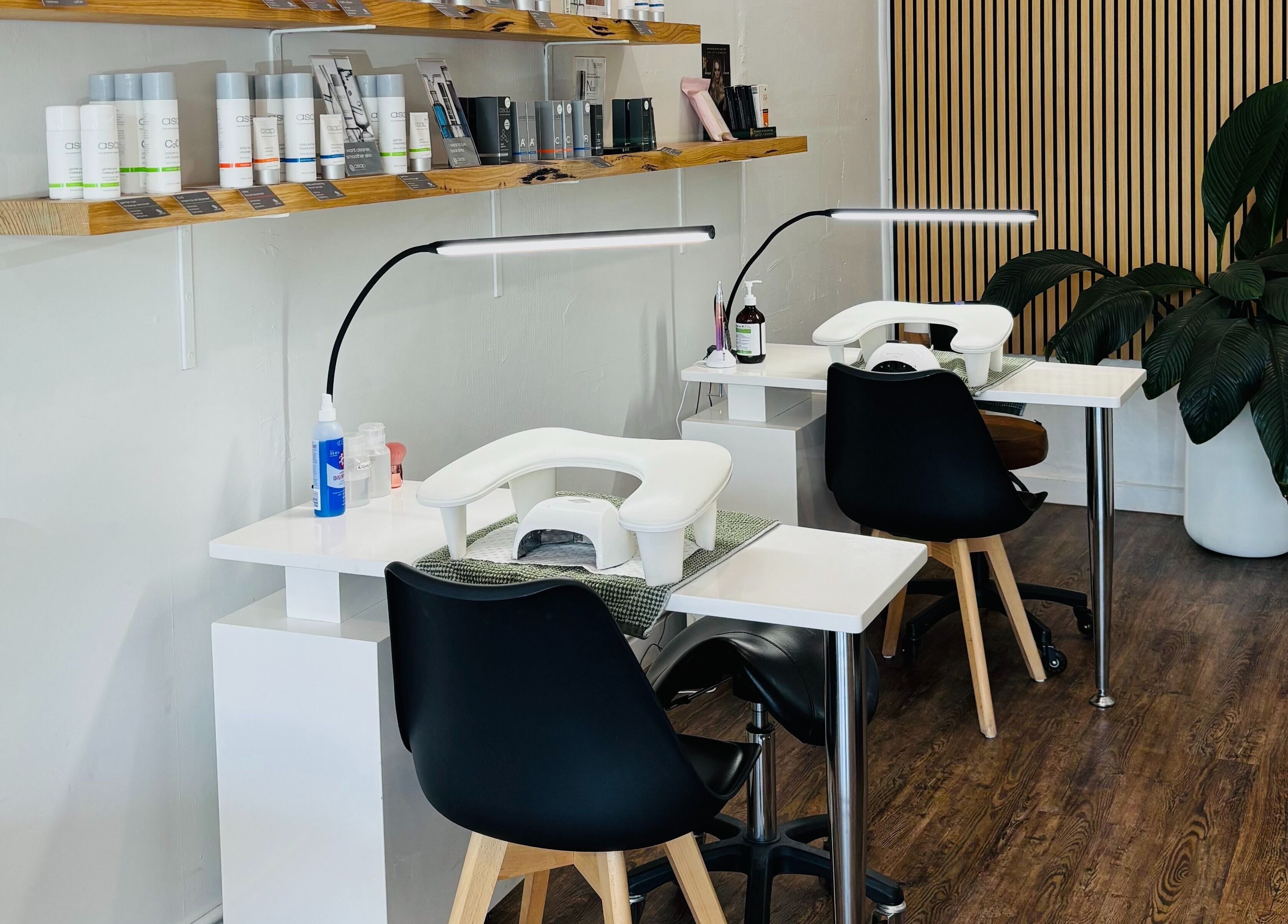 Nail stations at Beauty on Eighth, Mildura, Victoria, AU, featuring modern setup and plants.