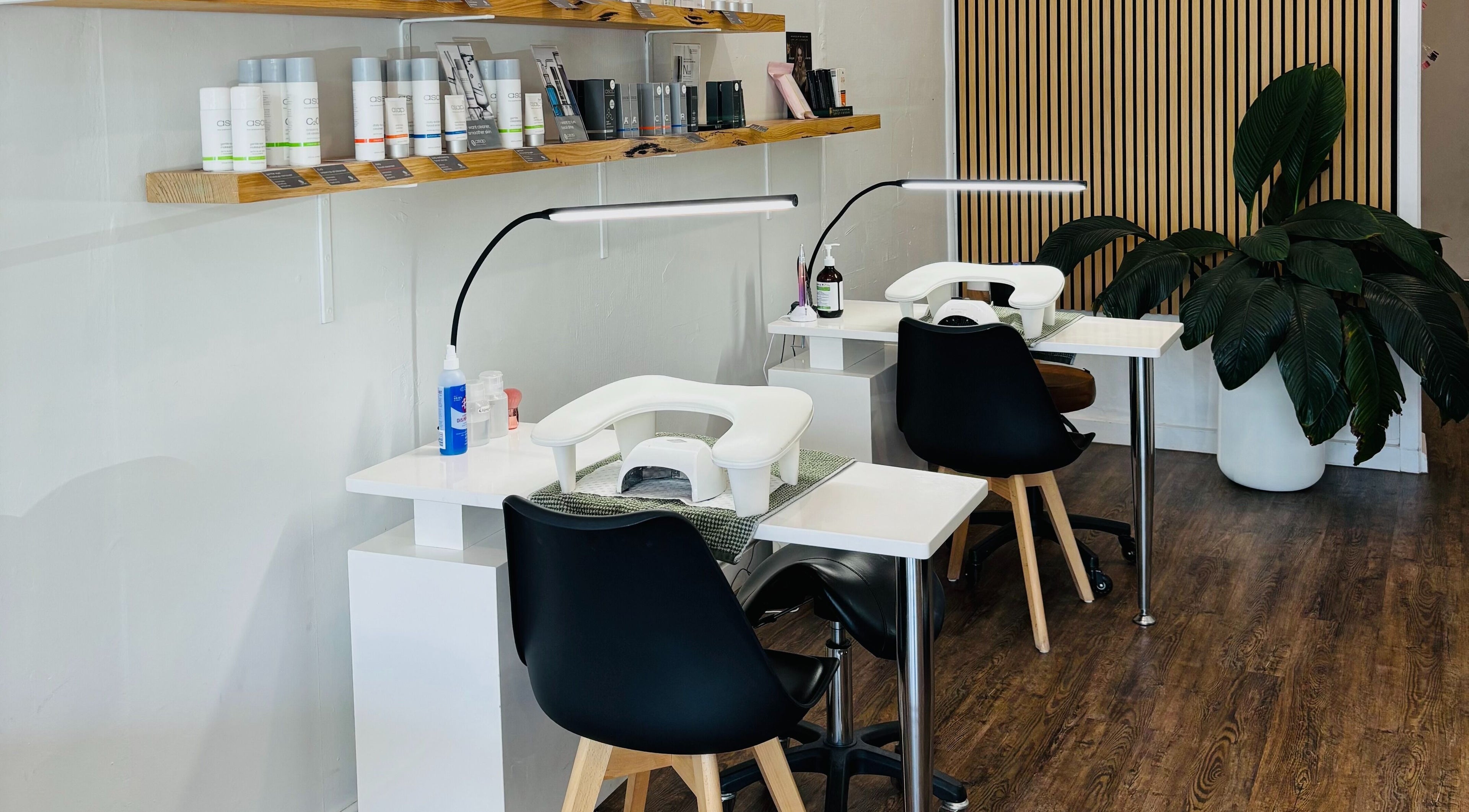 Nail stations at Beauty on Eighth, Mildura, Victoria, AU, featuring modern setup and plants.