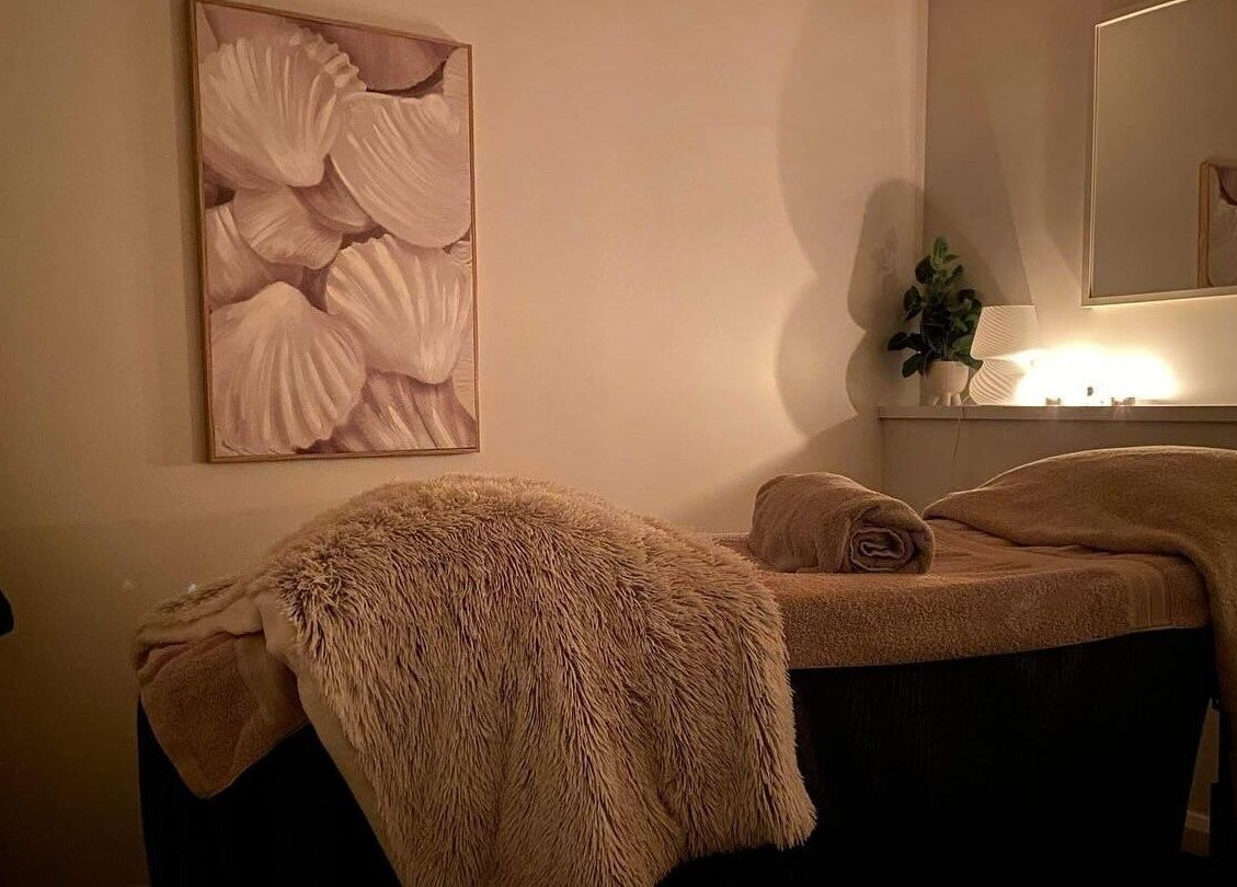 Cozy massage table at Beauty on Eighth, Mildura, Victoria, AU, set with soft lighting and plush blankets.