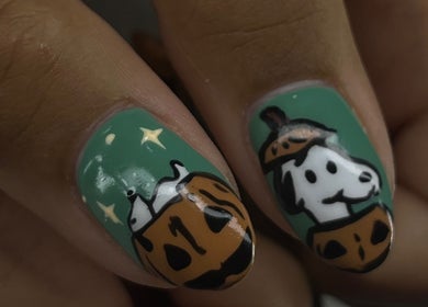 Creative pumpkin nail art at Swaggie Nailz, Brick Township, New Jersey, US. Perfect for festive flair.