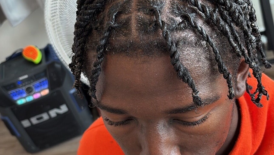 Intricate braided hairstyle at StyledByMarah, Bowling Green, Ohio, US salon, showcasing detailed craftsmanship.