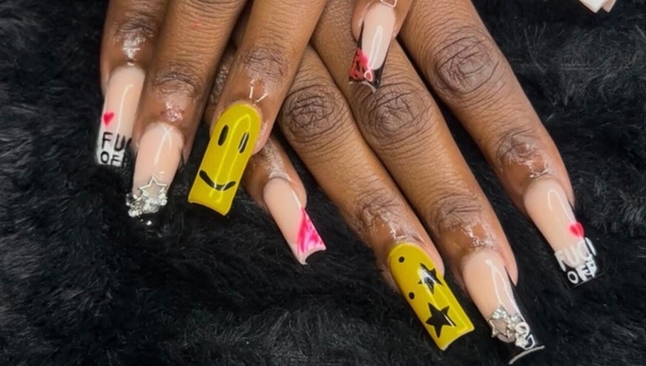 Colorful nail art at 5 Star Nails in Marrero, Louisiana, US, featuring unique and vibrant patterns.