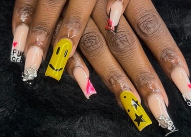 Colorful nail art at 5 Star Nails in Marrero, Louisiana, US, featuring unique and vibrant patterns.