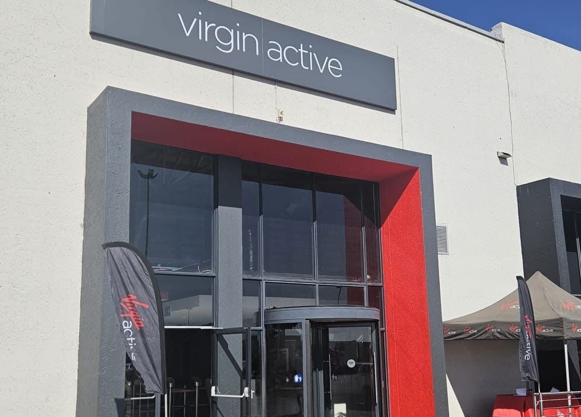 Entrance of Zee Mania in Centurion, Gauteng, ZA, showcasing modern design and vibrant facade.