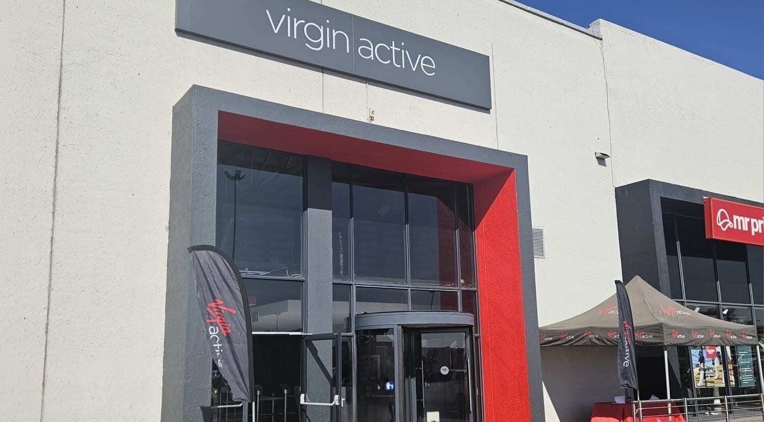 Entrance of Zee Mania in Centurion, Gauteng, ZA, showcasing modern design and vibrant facade.