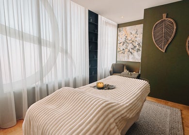 Cozy massage room at Eden Massage Studio in East Perth, Western Australia, AU. Elegant decor and soft lighting.