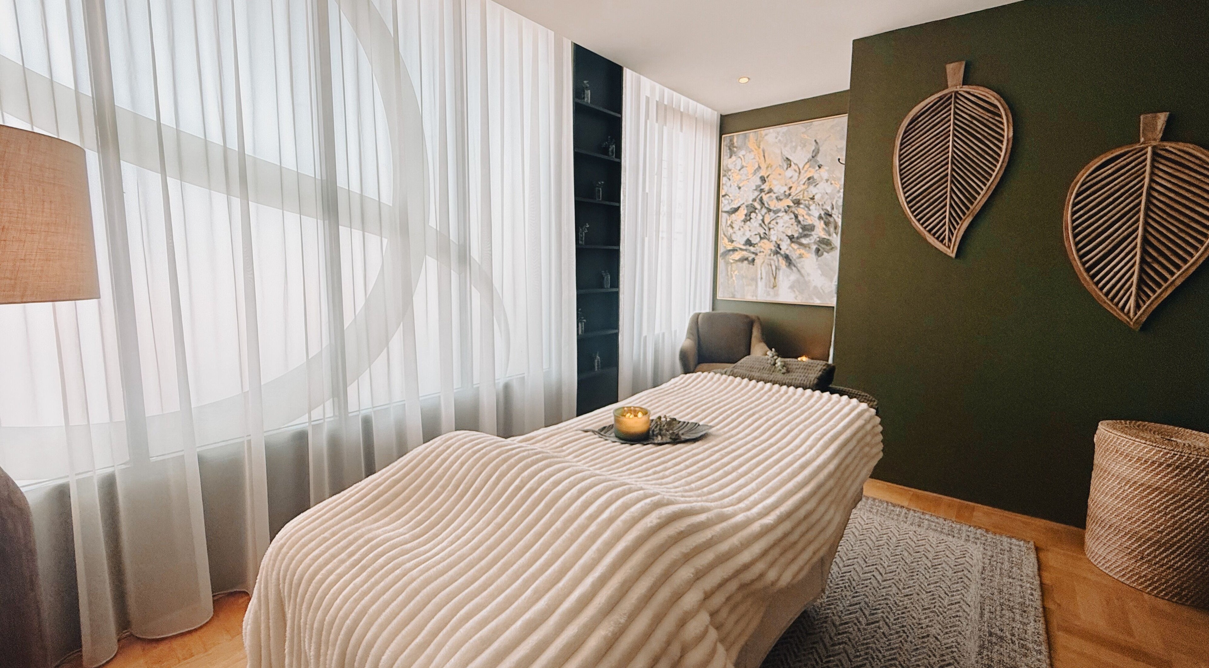 Cozy massage room at Eden Massage Studio in East Perth, Western Australia, AU. Elegant decor and soft lighting.