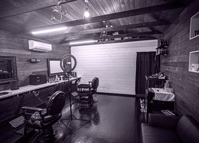 Stylish barber chairs and mirror at Scholar & Scoundrel, Armadale, Western Australia, AU.