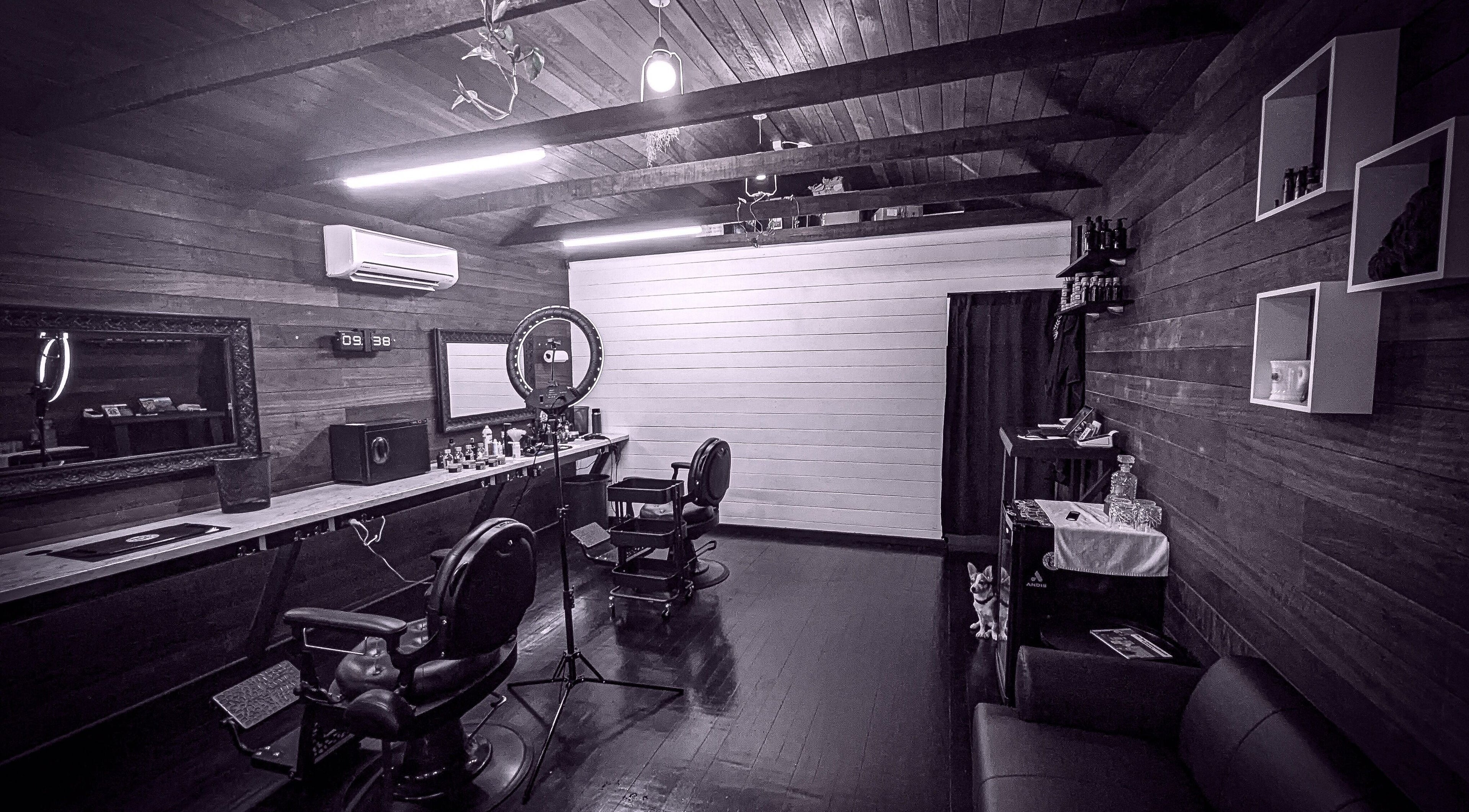 Stylish barber chairs and mirror at Scholar & Scoundrel, Armadale, Western Australia, AU.