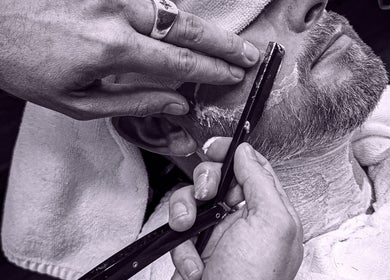 Close-up of a straight razor shave at Scholar & Scoundrel, Armadale, Western Australia, AU.