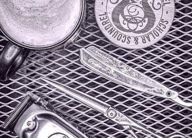 Grooming tools and coffee at Scholar & Scoundrel, Armadale, Western Australia, AU, showcase sophistication and style.
