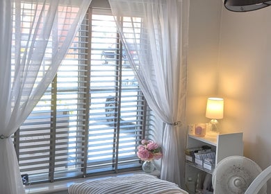 Bright, cozy room at The Lash Retreat in Golborne, England, GB, with soft lighting and chic decorations.