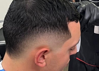 Close-up of a stylish haircut at Hafizi Barber, Melbourne, Victoria, AU, showcasing precision and artistry.
