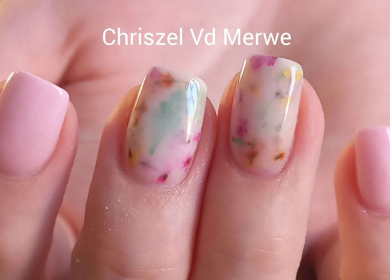 Artistic nail design at Blush Beauty in Middelburg, Mpumalanga, ZA, showcasing elegant multicolor patterns.