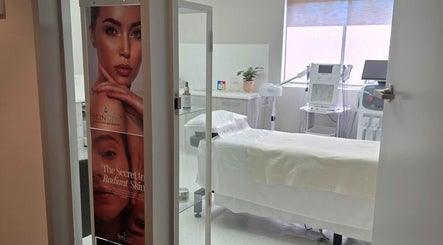 Elegant treatment room at DERMALINK STUDIO, Tarneit, Victoria, AU, showcasing skincare setup and decor.