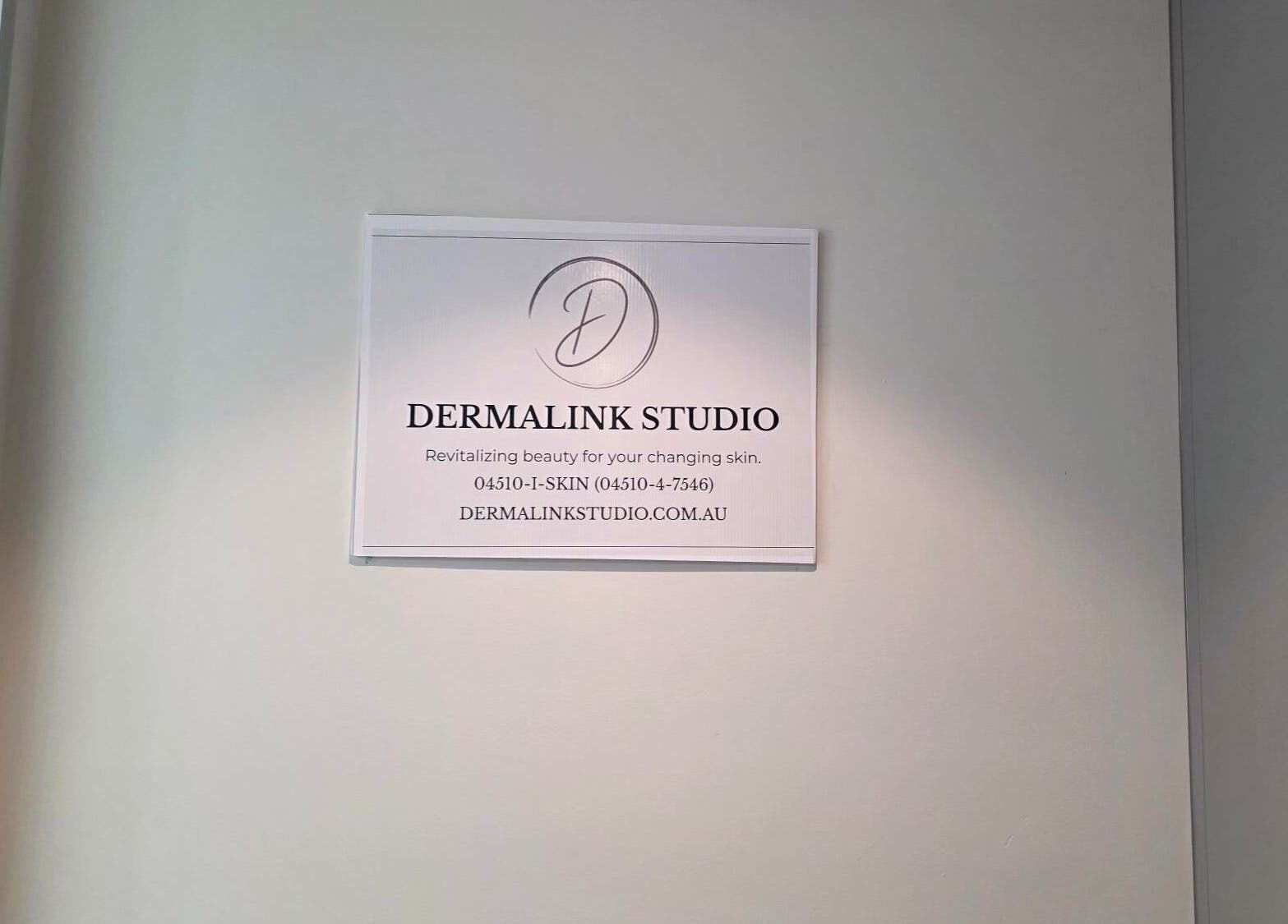DERMALINK STUDIO sign on wall, Tarneit, Victoria, AU.