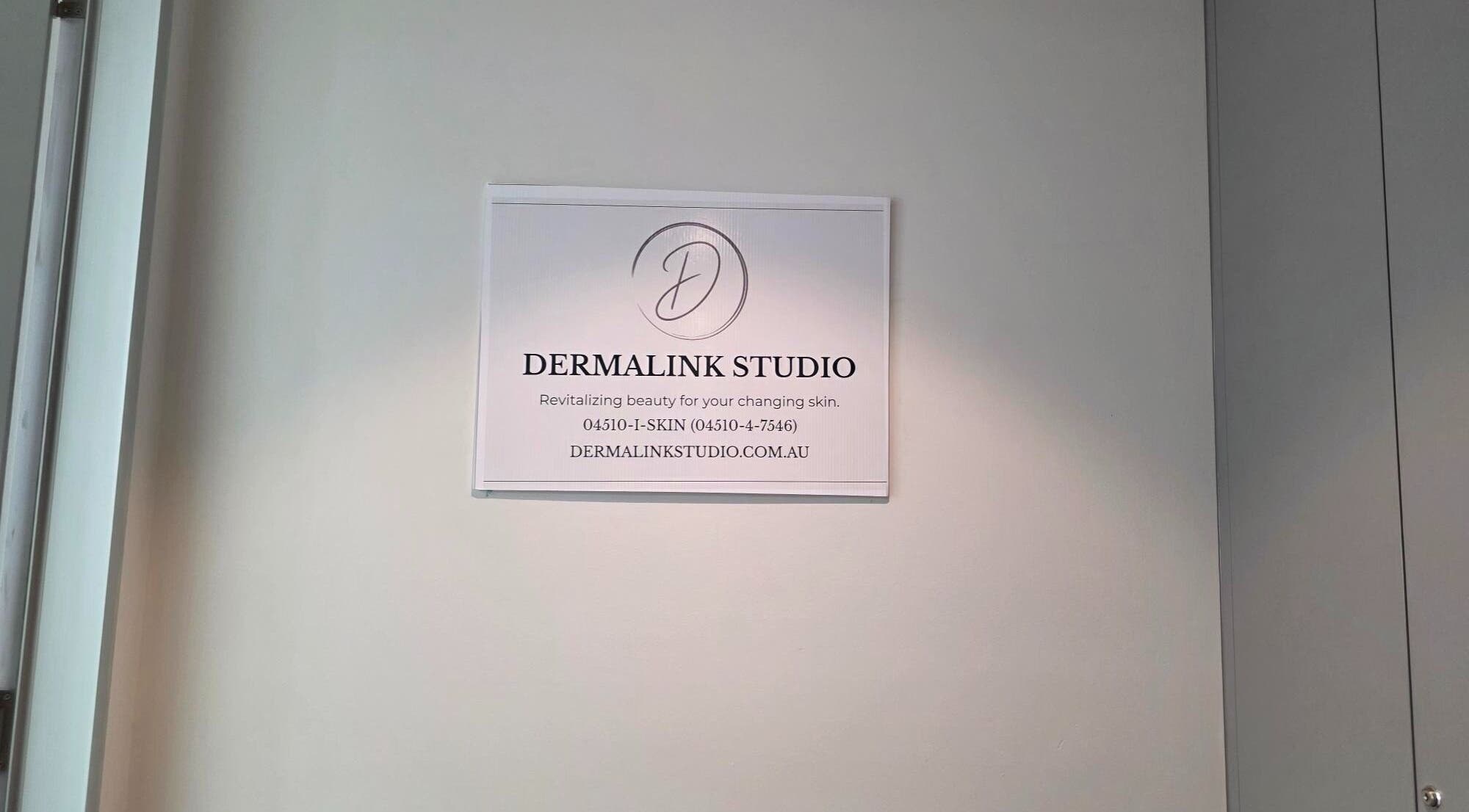 DERMALINK STUDIO sign on wall, Tarneit, Victoria, AU.
