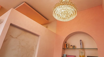 Elegant chandelier and pastel decor at G3 Bridal and Beauty Studio in Avadi, Tamil Nadu, IN.