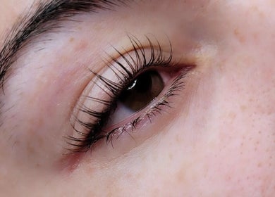 Close-up of an eye with beautifully curled eyelashes at Natures Embrace Spa in Madawaska, Ontario, CA.