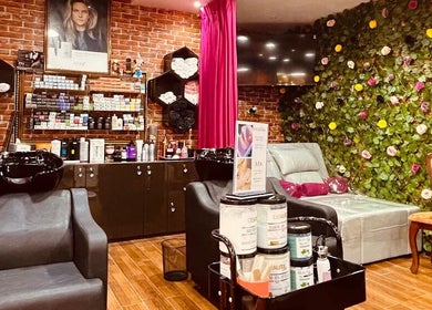 Interior of Pink Blink The Beauty Lounge in Dubai, AE featuring stylish decor and beauty products.