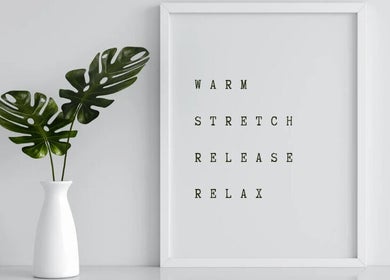 Calming decor with white vase and framed words at WellBalance Health Therapies, Edinburgh, Scotland, GB.