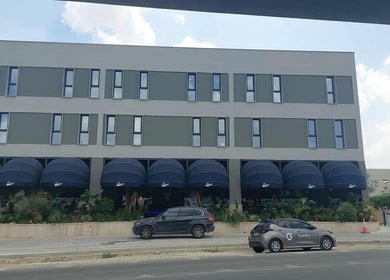 Exterior view of Endurance Physio in Strovolos, Lefkosia, CY, showcasing a sleek, modern facade.
