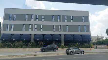 Exterior view of Endurance Physio in Strovolos, Lefkosia, CY, showcasing a sleek, modern facade.