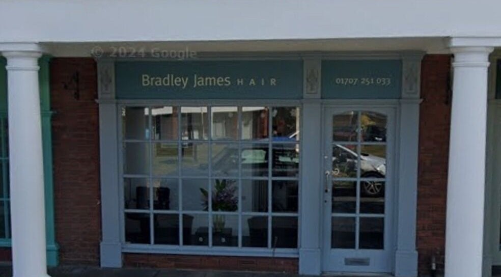 Exterior of Bradley James Hair near Hollies Beauty Room, Hatfield, England, GB.