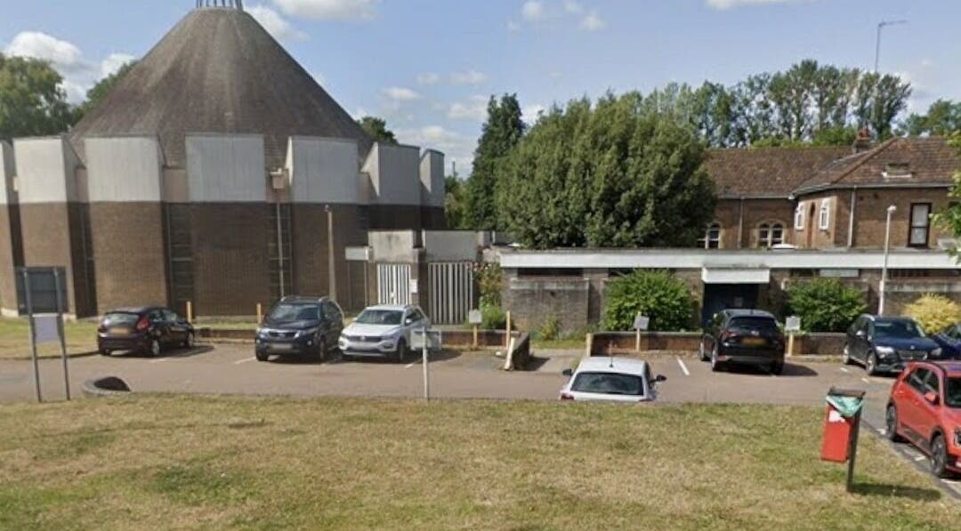 Exterior of Hollies Beauty Room in Hatfield, England, GB showcasing modern architecture and parking space.