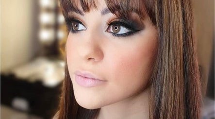 Striking eye makeup at Luxx Artistry, Germiston, Gauteng, ZA showcasing perfect blend and bold lashes.
