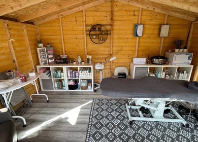 Interior view of Kirsty’s Beauty Cabin in Cowdenbeath, Scotland, showcasing a serene treatment space.