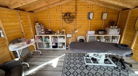 Interior view of Kirsty’s Beauty Cabin in Cowdenbeath, Scotland, showcasing a serene treatment space.
