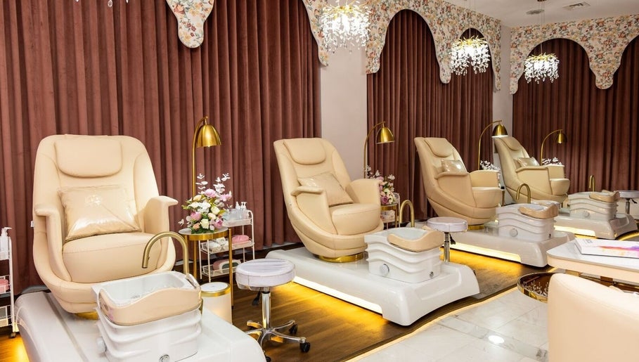 Luxurious pedicure chairs at Maison De Beauté in Doha, Doha, QA offer a serene beauty experience.