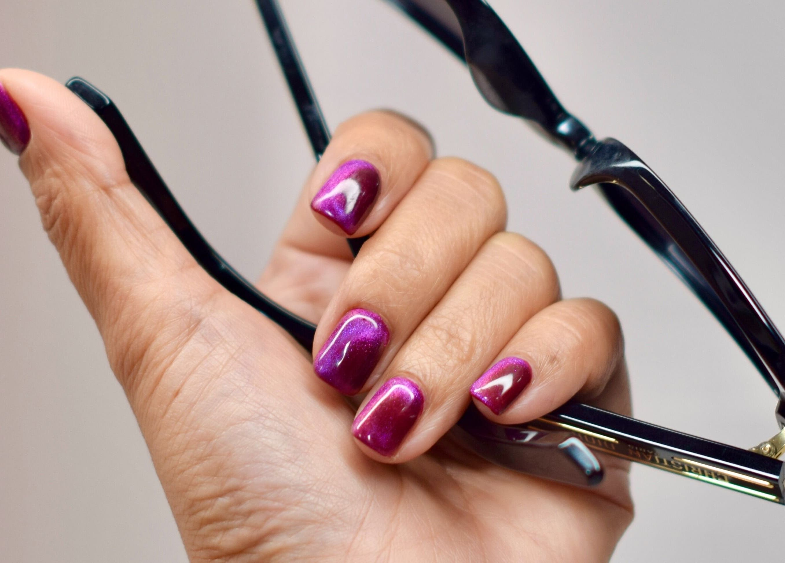 Elegant purple manicure from Maison De Beauté in Doha, Doha, QA, showcasing fine nail artistry.