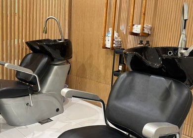Modern hair wash stations at Viola Beauty Salon, Al Mubarraz, Eastern Province, SA, offer a luxurious experience.