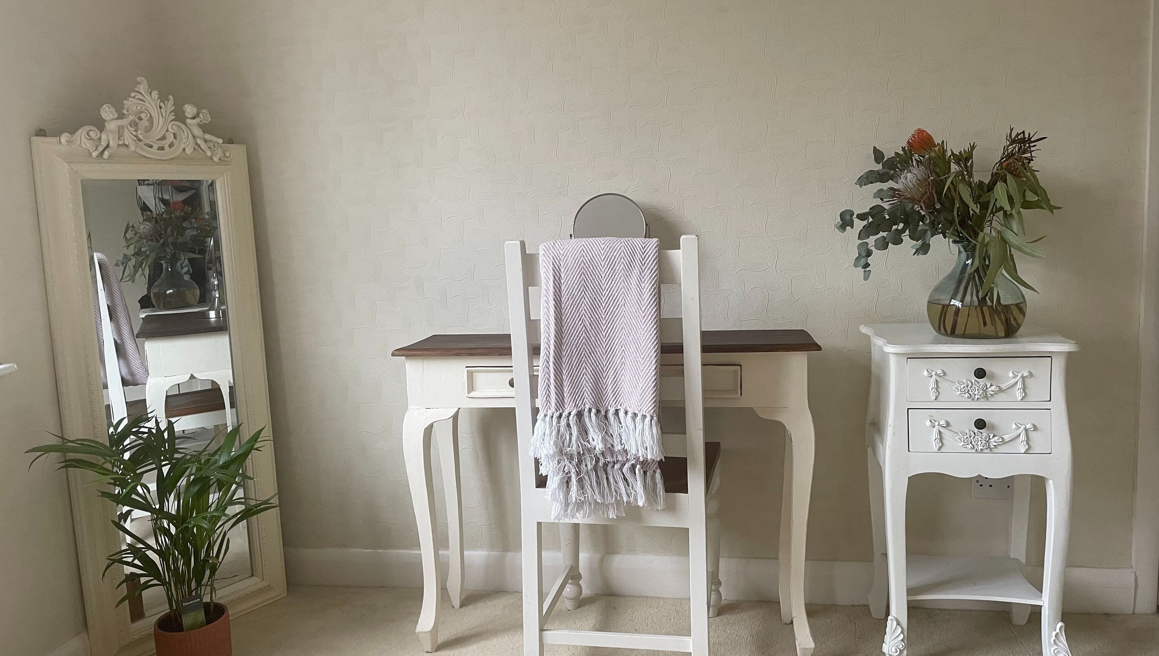 Chic beauty space at Temiluxe, Keynsham, England, GB with a vintage mirror and elegant decor.