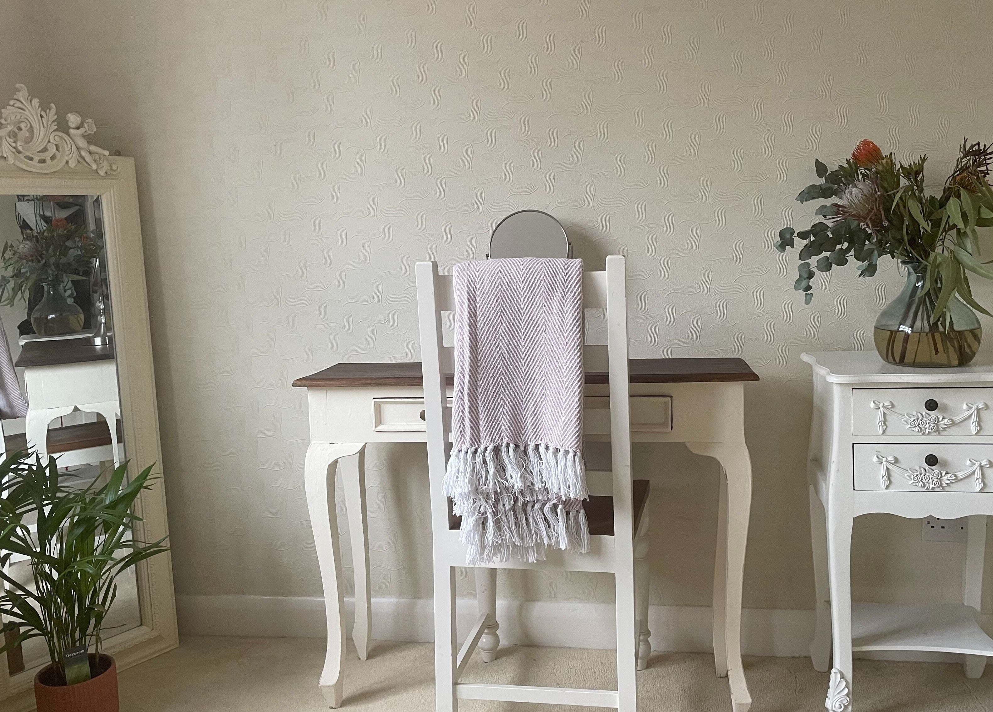 Chic beauty space at Temiluxe, Keynsham, England, GB with a vintage mirror and elegant decor.