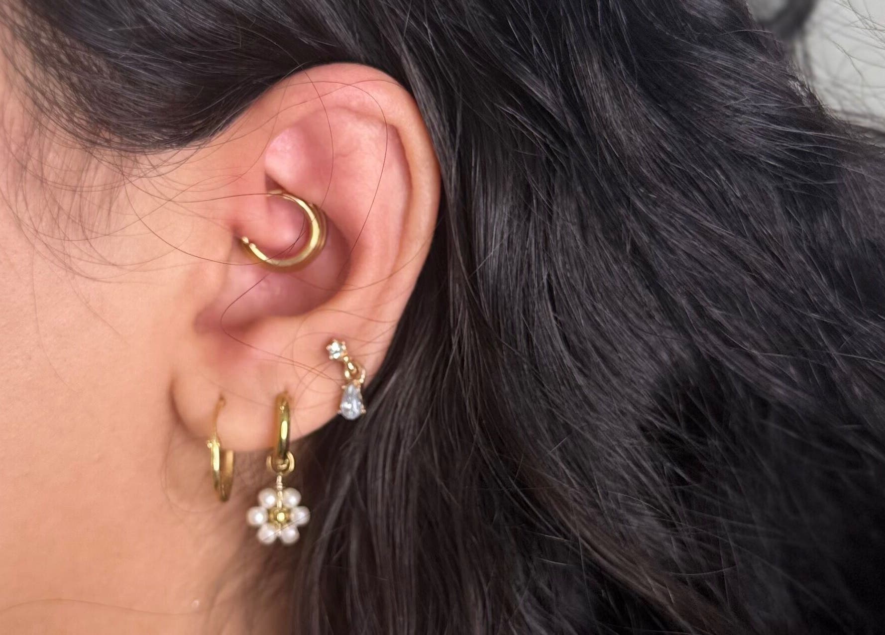 Stylish ear piercings from Monkey Piercing in Salmiya, Hawalli Governorate, KW