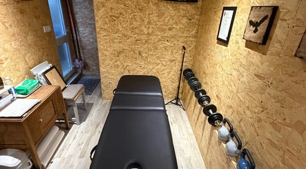 Therapy room with gym equipment at Everything Rehab, Northampton, England, GB. Cozy and functional interior.