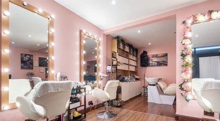 Ami Stylist salon in Portmore, St. Catherine Parish, JM with elegant mirrors and plush chairs in a chic ambiance.