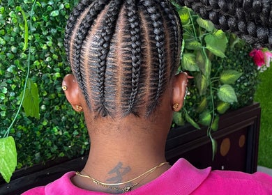 Intricate braided hairstyle at Ami Stylist, Portmore, St. Catherine Parish, JM, showcasing expert craftsmanship.