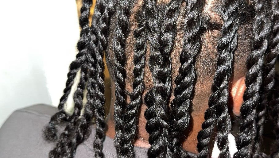 Close-up of intricate braids at Galorebeautylounge, London, England, GB, showcasing skilled hairstyling services.
