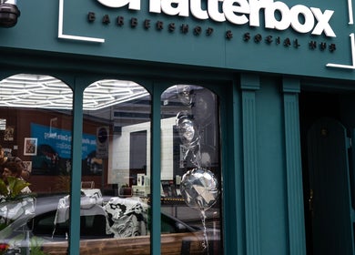 Chatterbox shopfront in Lisburn, Northern Ireland, showcasing modern barbershop setting.