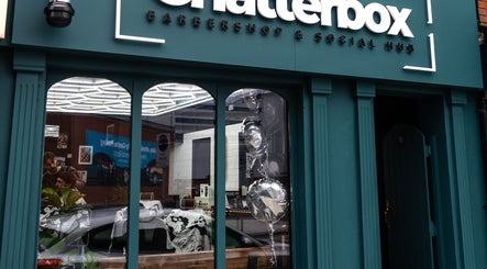 Chatterbox shopfront in Lisburn, Northern Ireland, showcasing modern barbershop setting.
