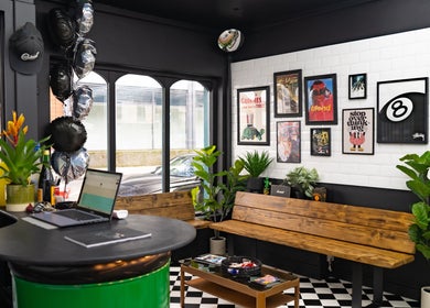 Chic interior of Chatterbox in Lisburn, Northern Ireland, GB with modern decor and vibrant artwork.