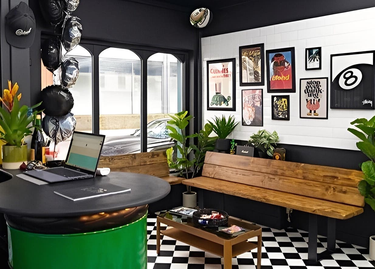 Cozy modern interior of Chatterbox in Lisburn, Northern Ireland, with plants and decor enhancing the ambiance.